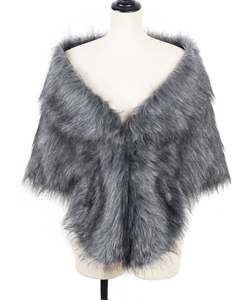 Close-up of luxury dark grey faux fox fur shawl with premium plush texture and V-wrap design