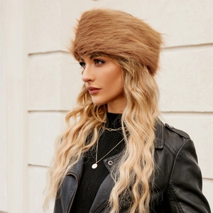 Close-up of thick brown faux fur hat showing dense texture and glossy finish