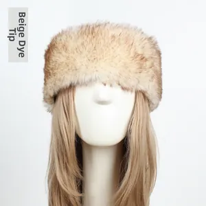 Detail of beige faux fur headband with gradient tips on a display model for winter