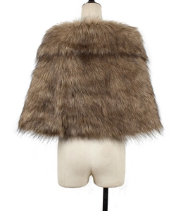 Detailed macro texture of faux rabbit fur shawl with dense fluffy brown pelage finish