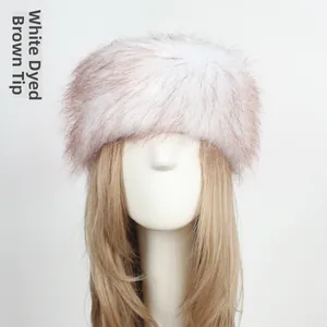 Detail of white faux fur Russian style hat with coffee-colored tips on a model head