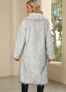 Detailed back view of a plush white faux fur long coat with black frosted tips texture
