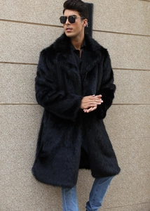 Detailed close-up of premium black faux fox fur texture on men's lapel overcoat