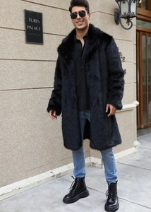 Detail shot of men's long black faux fur coat showing thick plush texture and wide lapels