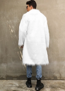 Back view of a man wearing a long white faux fur fox coat with a fluffy texture