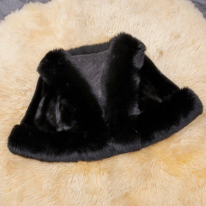 Detail view of plush black faux fox fur shawl showing premium fluffy texture and inner lining