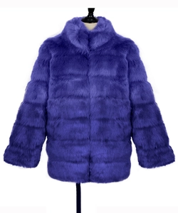 Close-up of luxury electric purple faux fur coat with horizontal paneling and stand collar