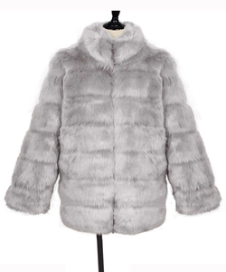Detail of light grey faux fur coat featuring horizontal striped patterns and thick texture