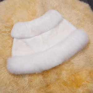 Detailed close-up of pure white faux fox fur shawl showing soft plush texture and thick density