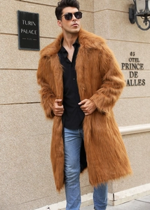 Detailed outdoor shot of long caramel faux fox fur coat with oversized lapels and fluffy texture