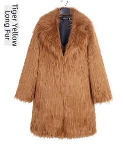 Detail view of tiger yellow long faux fur coat texture with a wide lapel design