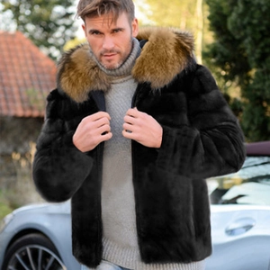 Men's black faux fur jacket with brown fur hood and zipper closure over grey knitwear