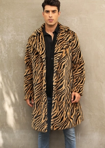 Detail view of long faux fur coat with bold tiger print pattern and lapel design