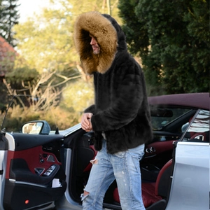 Men's luxury black faux fur jacket with a large brown hooded collar for outdoor winter wear