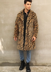 Macro detail of faux fur texture and tiger stripe pattern on long lapel coat