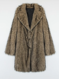 Detail of tan faux fox fur long coat featuring large lapels and smooth black lining