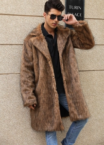 Detailed close-up of thick faux fox fur texture on men's tan long lapel overcoat