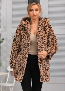 Detailed view of high-quality leopard print faux fur texture on a hooded women's jacket