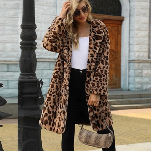 Detailed texture of women's leopard print faux fur coat with a large notched lapel