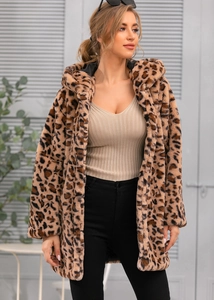 Close-up of leopard print faux fur texture on a hooded winter coat with soft plush feel