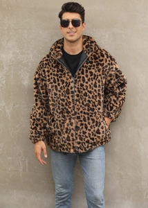 Macro detail of men's faux fur jacket showing the soft leopard print texture and zipper