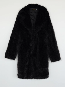Detailed close-up of premium black faux fox fur coat texture and soft inner lining