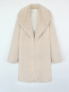 Detailed texture of women's beige faux fox fur coat with oversized lapel collar