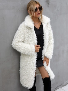 Women white faux fur teddy coat with oversized lapels and long fluffy silhouette