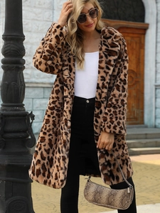 Stylish faux fur leopard print coat for women in a chic mid-length street style outfit
