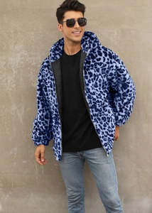 Detail of blue leopard print faux fur jacket with quilted lining and metal zipper