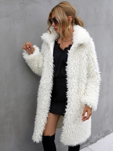 Women's white long faux fur coat with oversized lapel and cozy plush texture style
