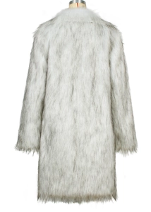 Detail view of snowy wolf pattern faux fur texture on the back of long winter coat