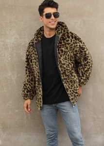 Detail of leopard print faux fur jacket showing the metal zipper and quilted lining