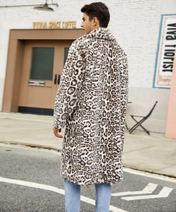 Outdoor shot of a man wearing a long faux fur leopard print coat with a large lapel collar