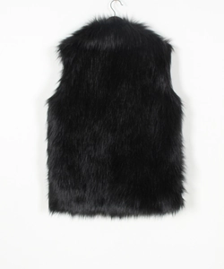 Detail of premium black faux fox fur vest showing thick texture and glossy long hair