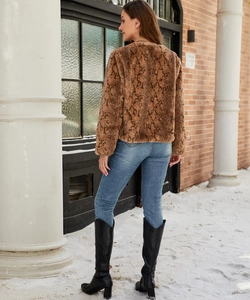 Back view of a women's faux fur jacket with brown snakeskin pattern and plush texture