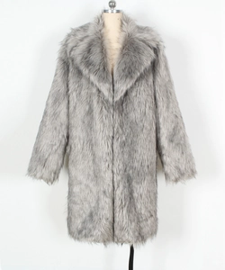 Detailed texture of charcoal grey faux fur collar on a long winter coat for women