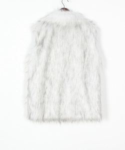 Back view of a fluffy white faux fox fur vest showing thick texture on a wooden hanger