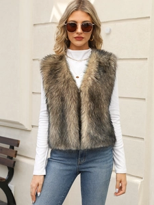 Detailed texture of a premium faux fur vest in gradient dark brown and beige tones