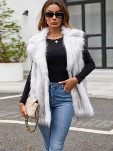 Women's faux fur vest in white with grey tips featuring a stylish large lapel
