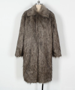 Detailed close-up of fluffy faux fur texture and collar on grey long-sleeved winter coat