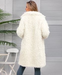 Back view of a long faux fur teddy coat in off-white showing thick fluffy texture