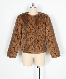 Detail showing the soft texture and snake skin pattern of the faux fur jacket