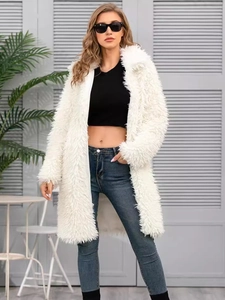 Elegant white faux fur coat with large lapel and plush texture for a stylish winter look