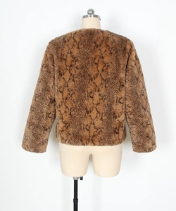 Detail view of brown snake print faux fur texture on short women's winter jacket