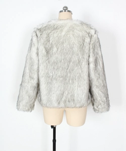 Detail of short faux fur jacket showing fluffy white and grey salt-and-pepper texture