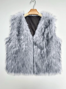 Detail of the deep V-neck and multi-tone faux fur texture on this stylish grey vest
