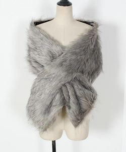 Luxurious grey faux fur shawl featuring a criss-cross front closure and plush texture