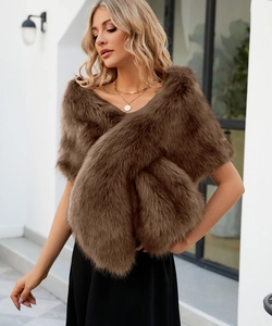 Detailed texture of dark brown faux fur shawl with elegant crisscross front design