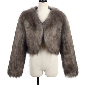 Detailed close-up of brown-grey faux fur short jacket texture with fluffy long hair material